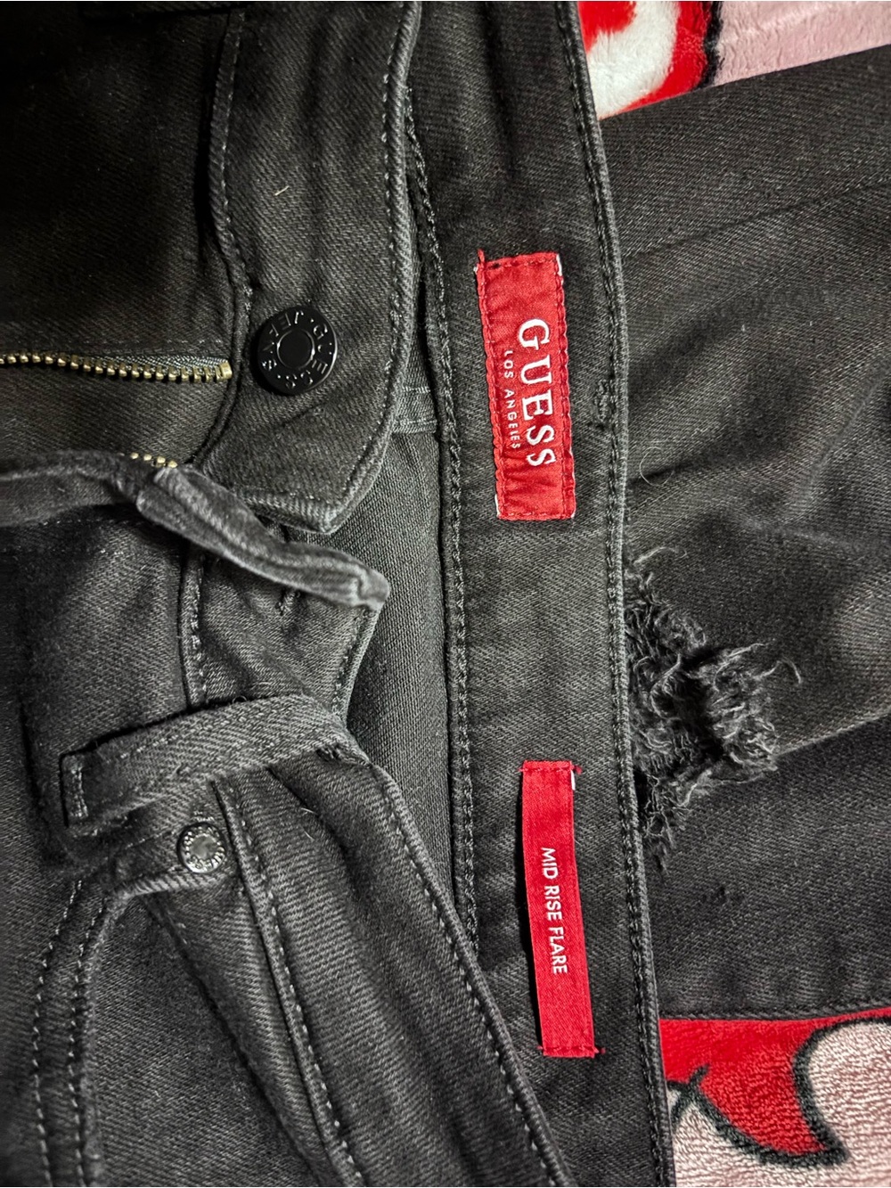 GUESS Black Mid-Rise flared ripped jeans